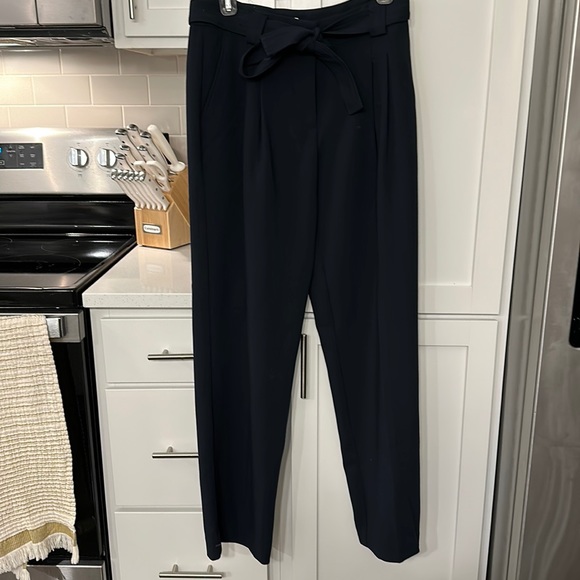 Anthropologie navy pants with bow. Size 4. Never worn. - Picture 1 of 3